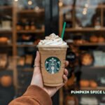 holding starbucks pumpkin spice lattes psl